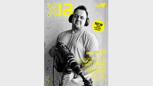 Titelbild einer Ausgabe von XIA by AIT auf grauem Hintergrund